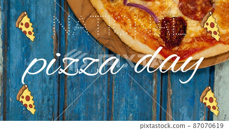 Digital composite image of pizza day text and slices over baked pizza served at table 87070619