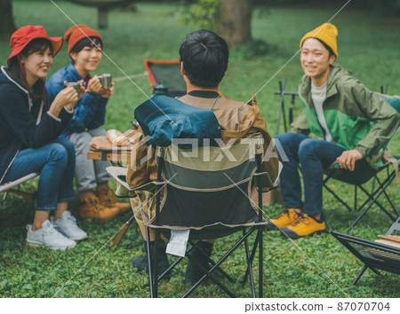 A man talking at a camp 87070704