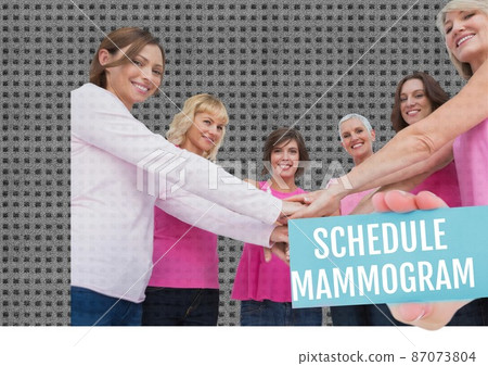 Schedule mammogram text banner over group of caucasian women stacking their hands together Schedule mammogram text banner over group of caucasian women stacking their hands together 87073804