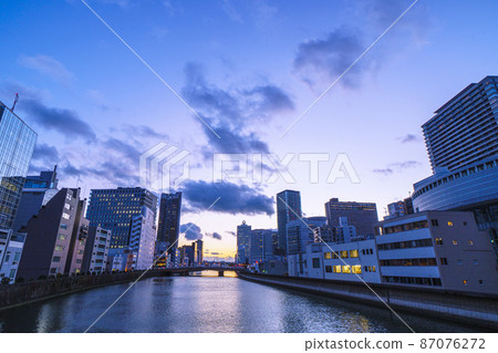 Evening view of Osaka Science Museum from Chikuzen Bridge 87076272