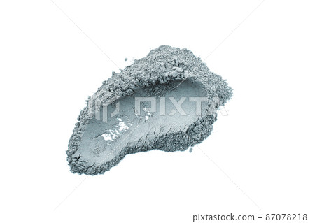 Dry blue cosmetic clay smear isolated on white background. Abstract sample of blue cosmetic clay or eye shadow. 87078218