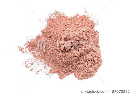 Dry red cosmetic clay isolated on white background. Heap of pink cosmetic clay. 87078222