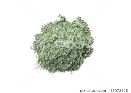 Dry green cosmetic clay isolated on white background. Heap of natural organic green cosmetic clay. 87078228