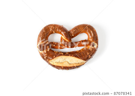 Tasty salt german pretzel isolated on white background. 87078341