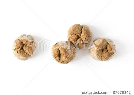 Rye buns isolated on white background top view. 87078342