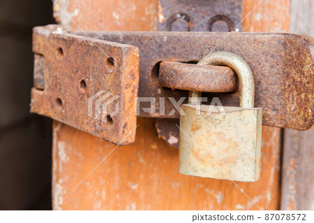 Rusty Key To The Wooden Door Rusty Key To The Wooden Door 87078572