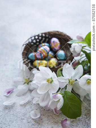 Colorful Easter eggs on concrete background 87082538