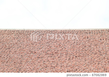 The roof tile pattern styled Thai. Clay Tiled Roof With Abstract And Brown. Thai traditonal Roof Tiles with texture background. 87082869