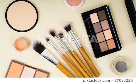 Group of cosmetic and makeup products on studio background Group of cosmetic and makeup products on studio background 87083226