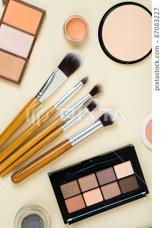 Group of cosmetic and makeup products on studio background Group of cosmetic and makeup products on studio background 87083227