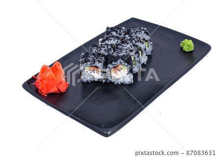 Japanese seafood Sushi roll isolated on white close up. Japanese food restaurant, sushi maki gunkan roll plate or platter set. Maki Sushi rolls with salmon and avocado. Sushi isolated at white 87083631