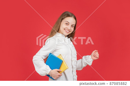 kid ready to study. happy childhood. child going to do homework with book. kid ready to study. happy childhood. child going to do homework with book. 87085882