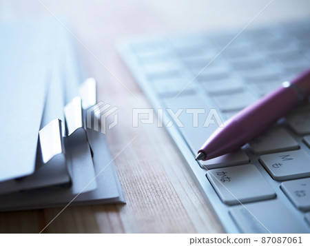 Business image of documents and keyboard (female) Business image of documents and keyboard (female) 87087061