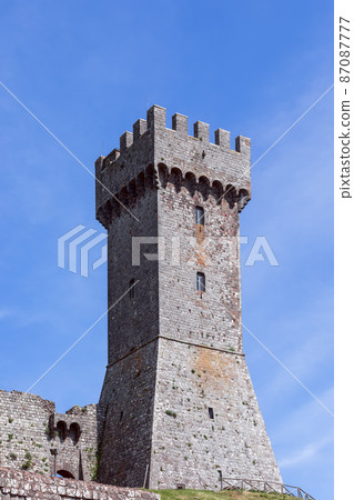 Vertical close shot of Rocca di Radicofani castle observation tower. Tuscany, Italy 87087777