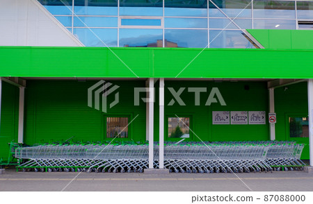 parking for shopping baskets. shopping in the supermarket. parked baskets. empty parking lot. Shopping Baskets for Products in supermarket 87088000