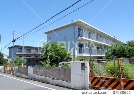 Abandoned apartment house 87088665