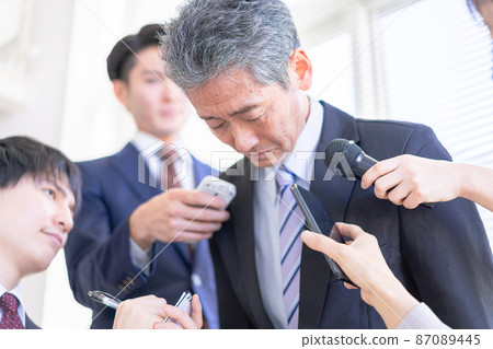 VIP surrounded by media at an apology press conference VIP surrounded by media at an apology press conference 87089445