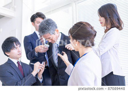 VIP surrounded by media at an apology press conference VIP surrounded by media at an apology press conference 87089448