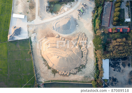 Pile of sand and rock in top view. 87089518