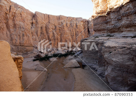Sandstone cliff, Atlas mountain in Tunisia Sandstone cliff, Atlas mountain in Tunisia 87090353