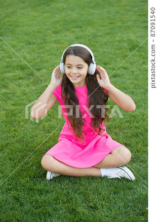 Ambient sound headphones. Happy child listen to sound Ambient sound headphones. Happy child listen to sound 87091540
