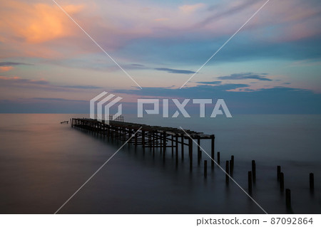 Beautiful dramatic sunset over the old bridge by the sea in Balchik, Bulgaria, Eastern Europe - dawn, dusk Beautiful dramatic sunset over the old bridge by the sea in Balchik, Bulgaria, Eastern Europe - dawn, dusk 87092864