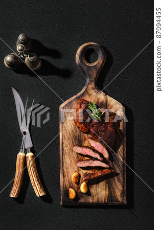 Top view of beefsteak spider fried in cast-iron pan 87094455