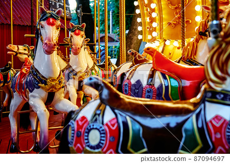 Horse carousel at amusement park Horse carousel at amusement park 87094697