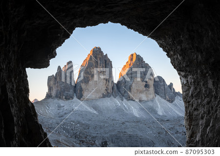 Tre Cime Di Lavaredo peaks in incredible orange sunset light Tre Cime Di Lavaredo peaks in incredible orange sunset light 87095303