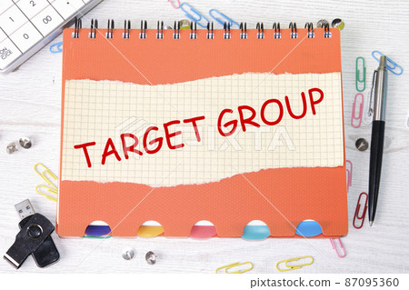 target group a phrase on a piece of paper next to stationery. business, technology, internet and networking concept 87095360