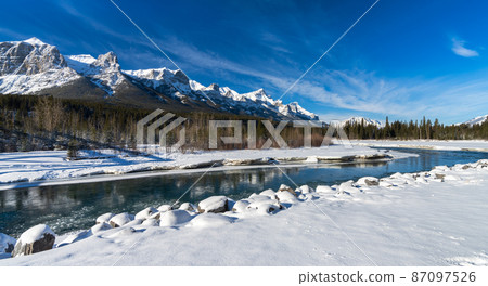 Superb view of Canmore in winter, Bow River, Canadian Rockies, Alberta, Canada 87097526