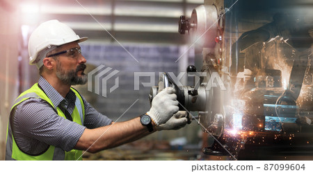 engineer on site working for production or maintenance big machine industry in factory engineer on site working for production or maintenance big machine industry in factory 87099604