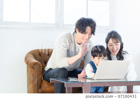 Parent-child copy space Aori backlit to talk with parents in the countryside on a computer Parent-child copy space Aori backlit to talk with parents in the countryside on a computer 87100431