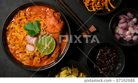 Khao Soi Kai, Unique northern Thai food cuisine served with side dish Khao Soi Kai, Unique northern Thai food cuisine served with side dish 87102088