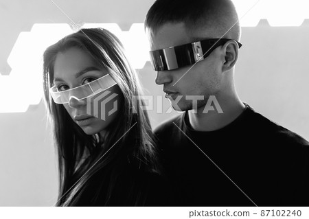 People in neon glasses. Cyberpunk. People in neon glasses. Cyberpunk. 87102240