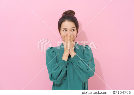 Female in her 20s portrait pink background 87104766