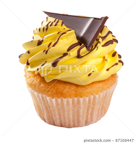 Vanilla cupcake with lemon whipped cream frosting and chocolate Vanilla cupcake with lemon whipped cream frosting and chocolate 87108447