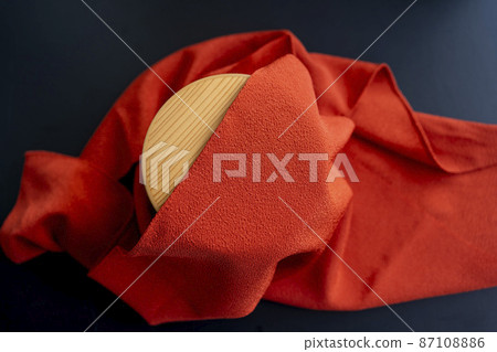 Japanese image of Japanese red furoshiki and round bento Japanese image of Japanese red furoshiki and round bento 87108886