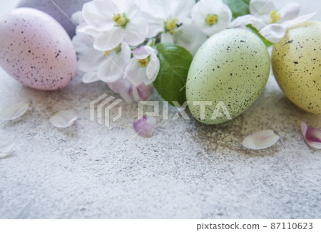 Colorful Easter eggs on concrete background Colorful Easter eggs on concrete background 87110623