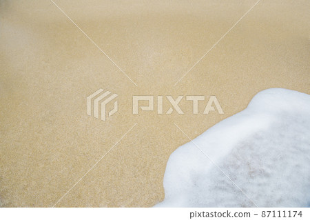 nature white sea wave on a sandy white beach 87111174