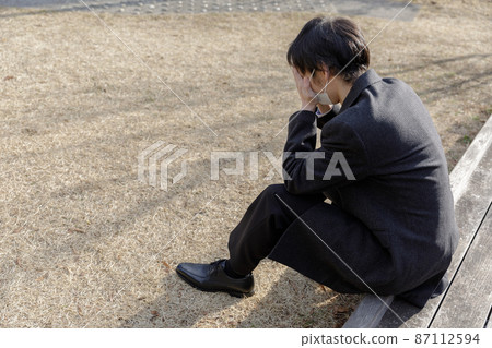 A man in a worried suit A man in a worried suit 87112594