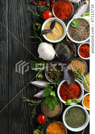 Concept of aromatic spices on rustic wooden table Concept of aromatic spices on rustic wooden table 87113716