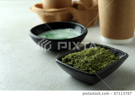 Concept of japanese tea with matcha on white textured table 87113787