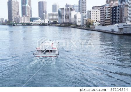 Small boat and river Small boat and river 87114234
