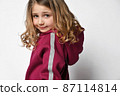 cropped photo of a girl in a warm burgundy hooded 87114814