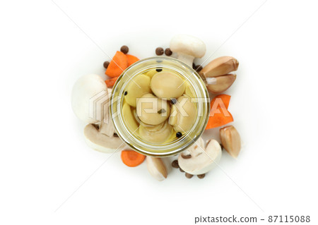 Jar of marinated mushrooms isolated on white background 87115088