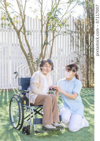Caregiver and senior women Caregiver and senior women 87117007