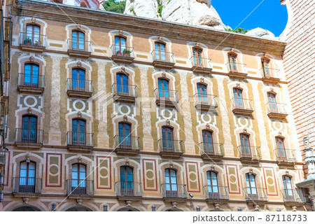 Details of the facade of the Monastery of Santa Maria de Montserrat on the mountain of Montserrat, Spain Details of the facade of the Monastery of Santa Maria de Montserrat on the mountain of Montserrat, Spain 87118733
