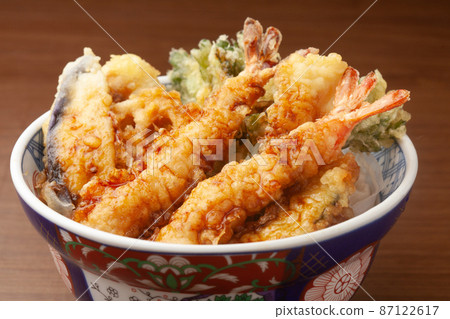 Bowl of rice and fried fish 87122617