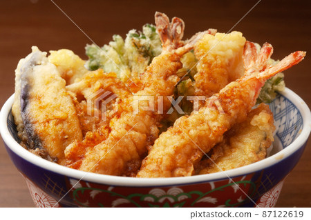 Bowl of rice and fried fish 87122619